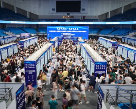 University graduates attend a job fair in Wuhan
