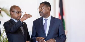Senate Speaker Amason Kingi (left) and National Assembly counterpart Moses Wetang'ula interacting.