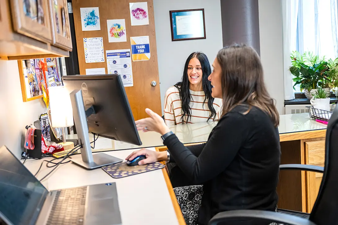 student receiving advice from Tina Cunningham in Academic Advising