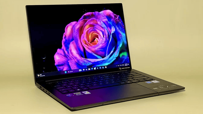 the acer swift x 14 against a yellow background