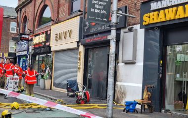 Fire in barber shop along Curry Mile